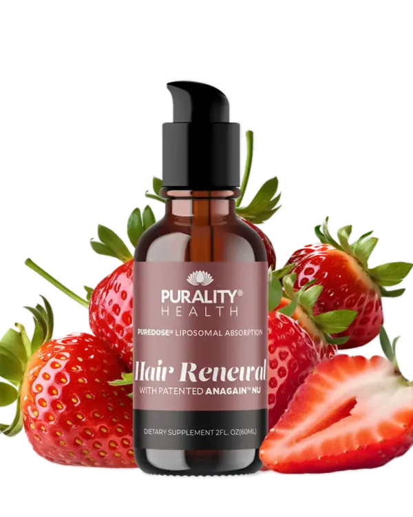 Purality Health Hair Renewal Bottle with Fresh Strawberries on Black Background